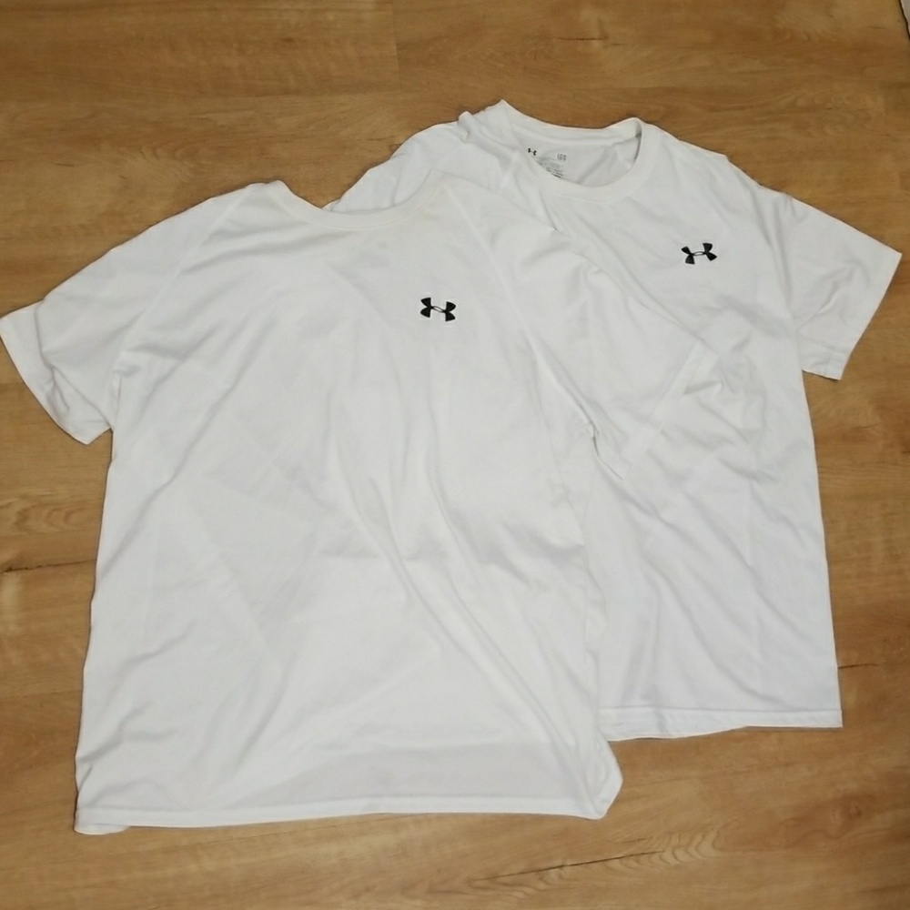 2 Under armour white work out shirts.